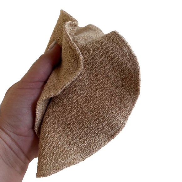 hand holding cleaning cloth to show size