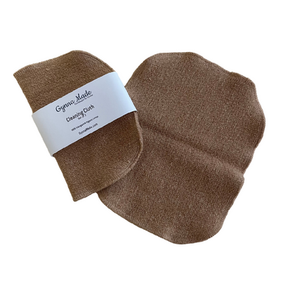 set of two cleaning cloths, one folded in label, the other laying flat to show size